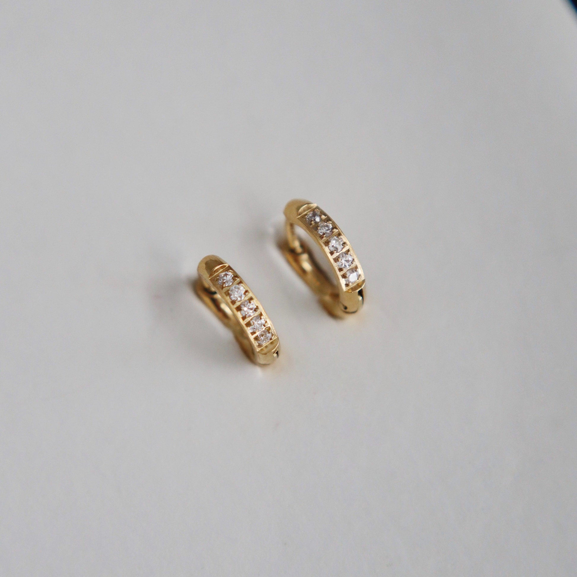 Hailey Huggies | Dainty CZ Huggies - JESSA JEWELRY | GOLD JEWELRY; dainty, affordable gold everyday jewelry. Tarnish free, water-resistant, hypoallergenic. Jewelry for everyday wear