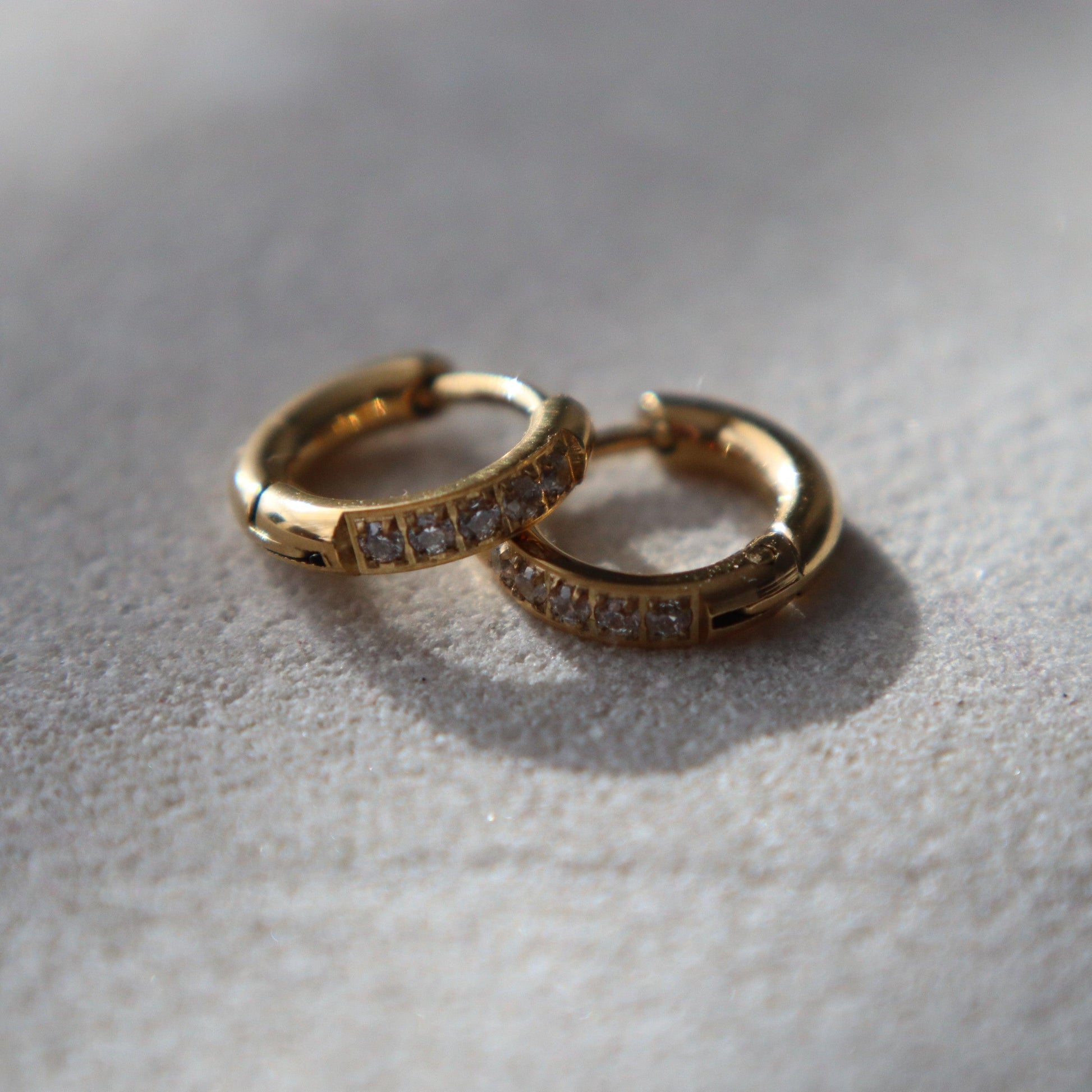 Hailey Huggies | Dainty CZ Huggies - JESSA JEWELRY | GOLD JEWELRY; dainty, affordable gold everyday jewelry. Tarnish free, water-resistant, hypoallergenic. Jewelry for everyday wear