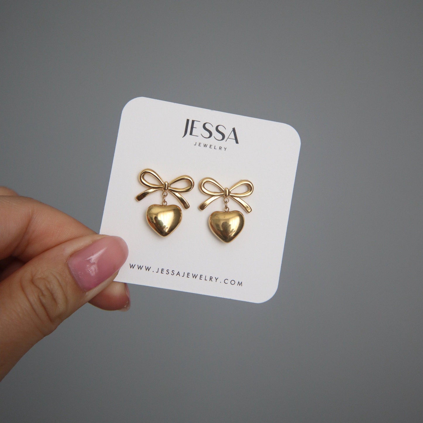 Bow Heart Earrings | Dangle Earrings - JESSA JEWELRY | GOLD JEWELRY; dainty, affordable gold everyday jewelry. Tarnish free, water-resistant, hypoallergenic. Jewelry for everyday wear