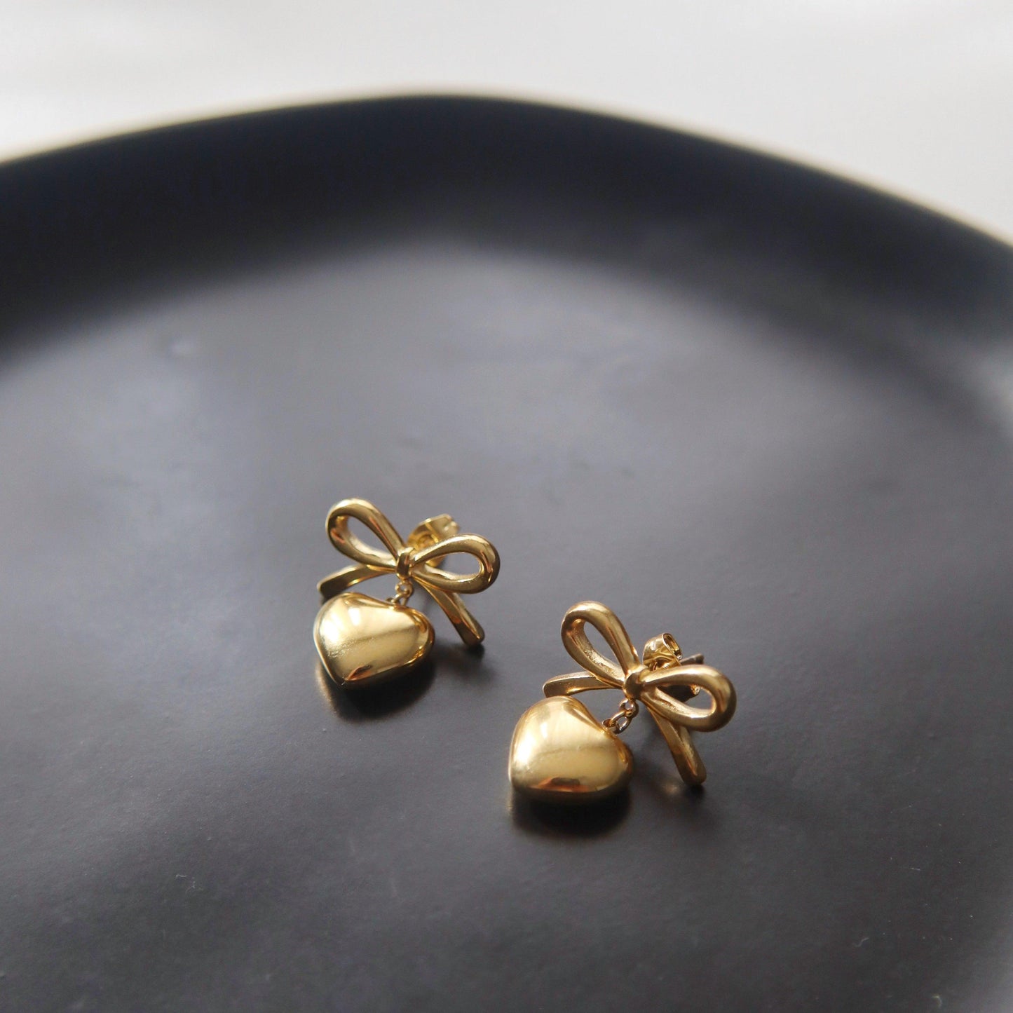 Bow Heart Earrings | Dangle Earrings - JESSA JEWELRY | GOLD JEWELRY; dainty, affordable gold everyday jewelry. Tarnish free, water-resistant, hypoallergenic. Jewelry for everyday wear