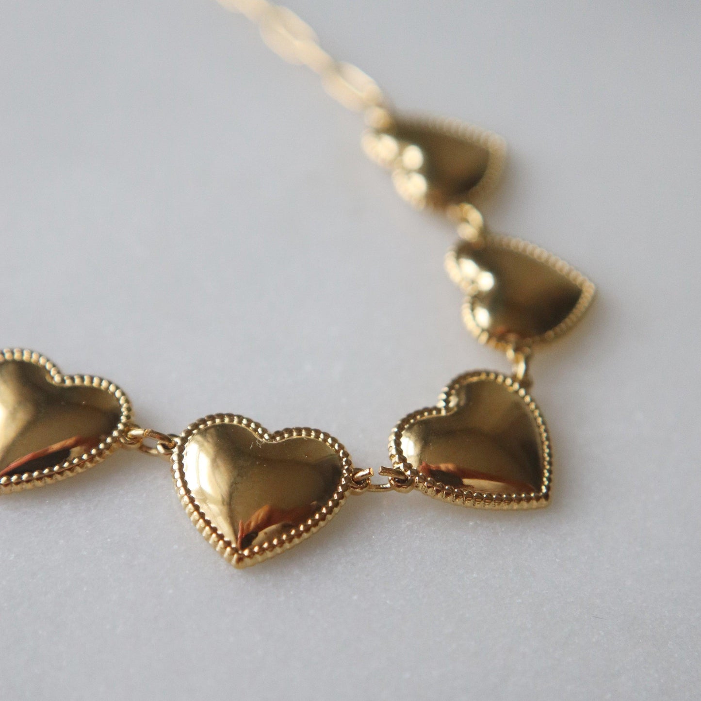 Hearts of Gold Necklace - JESSA JEWELRY | GOLD JEWELRY; dainty, affordable gold everyday jewelry. Tarnish free, water-resistant, hypoallergenic. Jewelry for everyday wear