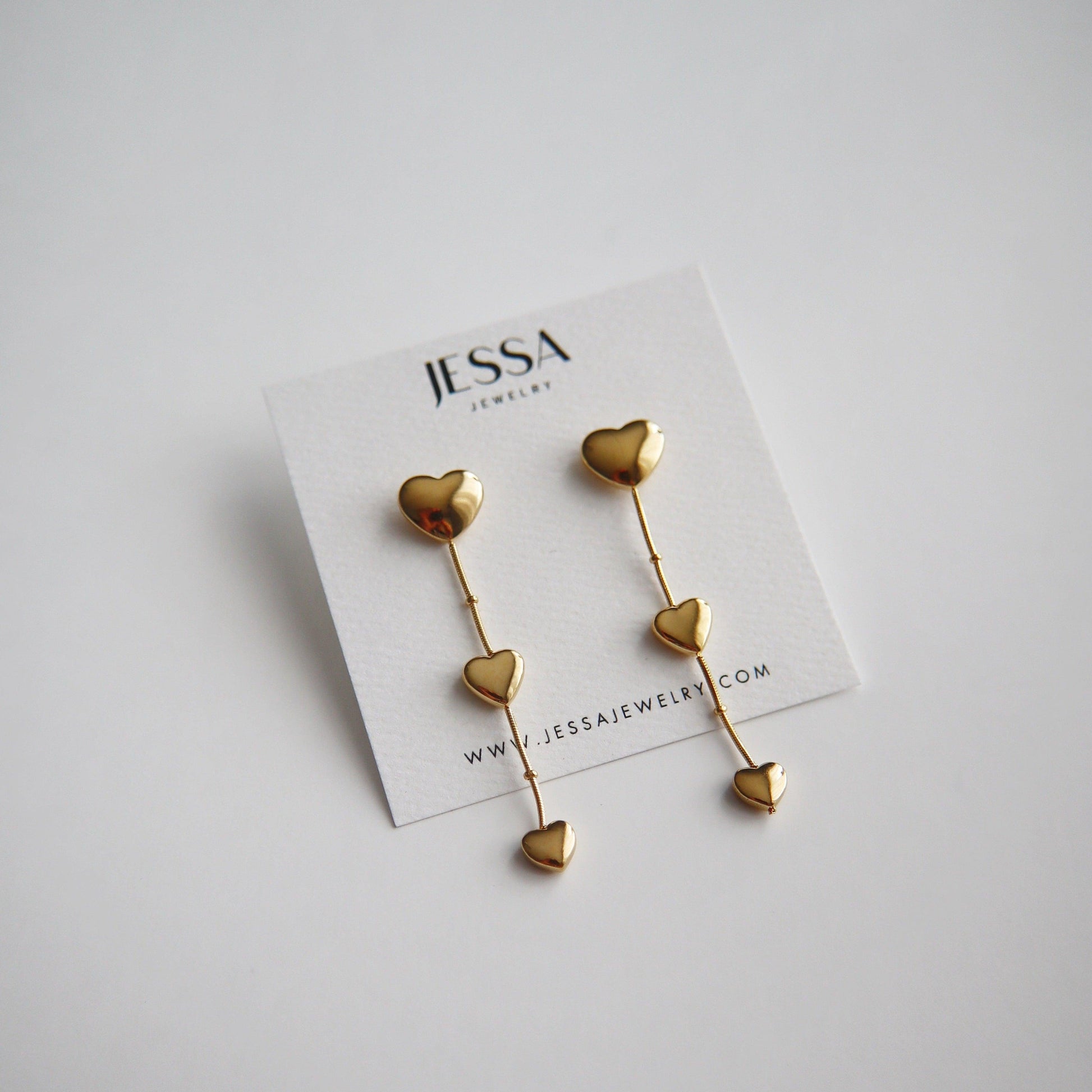 Triple Heart Dangle Earrings - JESSA JEWELRY | GOLD JEWELRY; dainty, affordable gold everyday jewelry. Tarnish free, water-resistant, hypoallergenic. Jewelry for everyday wear