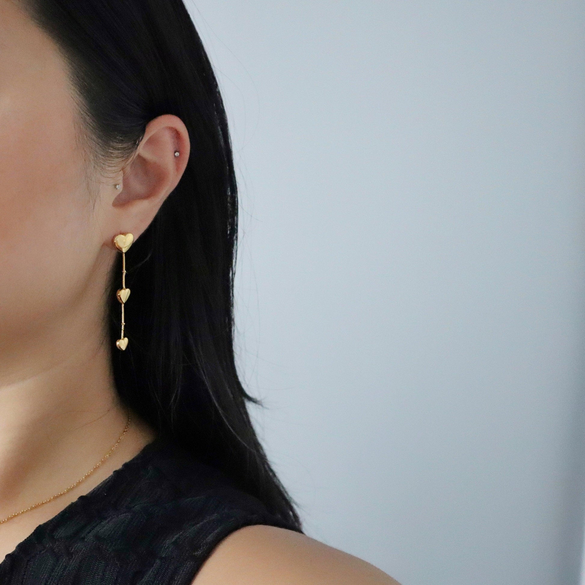 Triple Heart Dangle Earrings - JESSA JEWELRY | GOLD JEWELRY; dainty, affordable gold everyday jewelry. Tarnish free, water-resistant, hypoallergenic. Jewelry for everyday wear