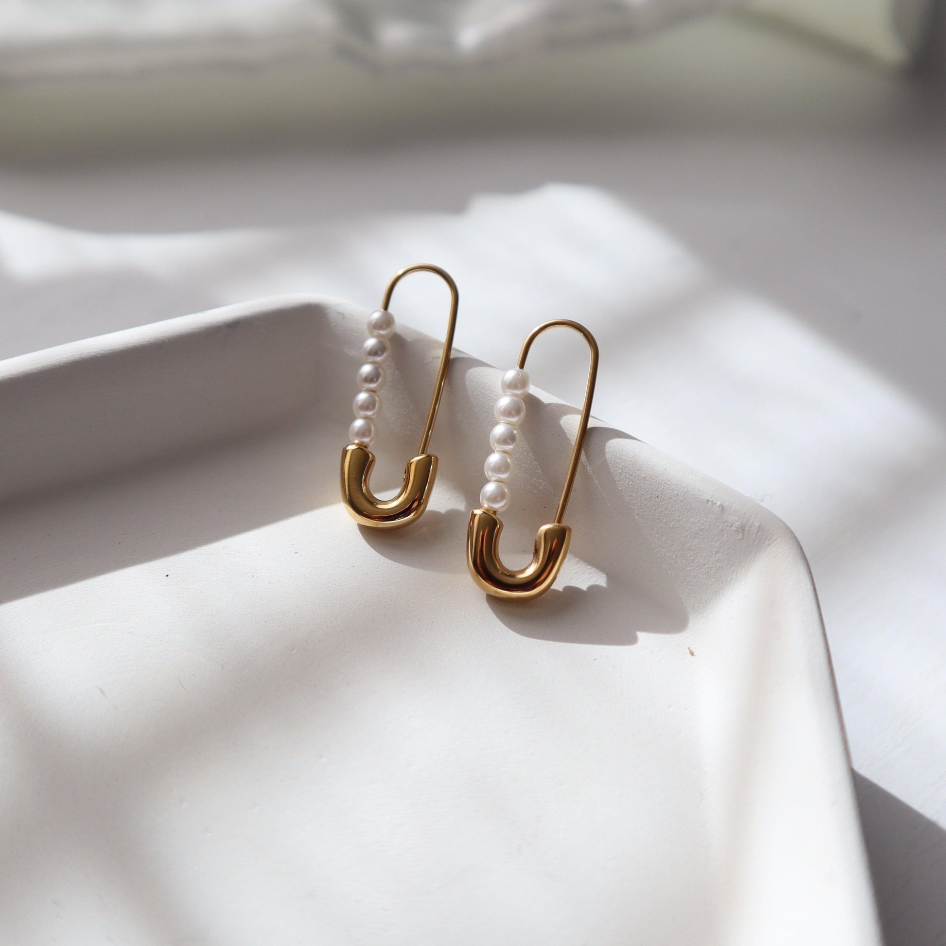Safety Pin Earrings - JESSA JEWELRY | GOLD JEWELRY; dainty, affordable gold everyday jewelry. Tarnish free, water-resistant, hypoallergenic. Jewelry for everyday wear