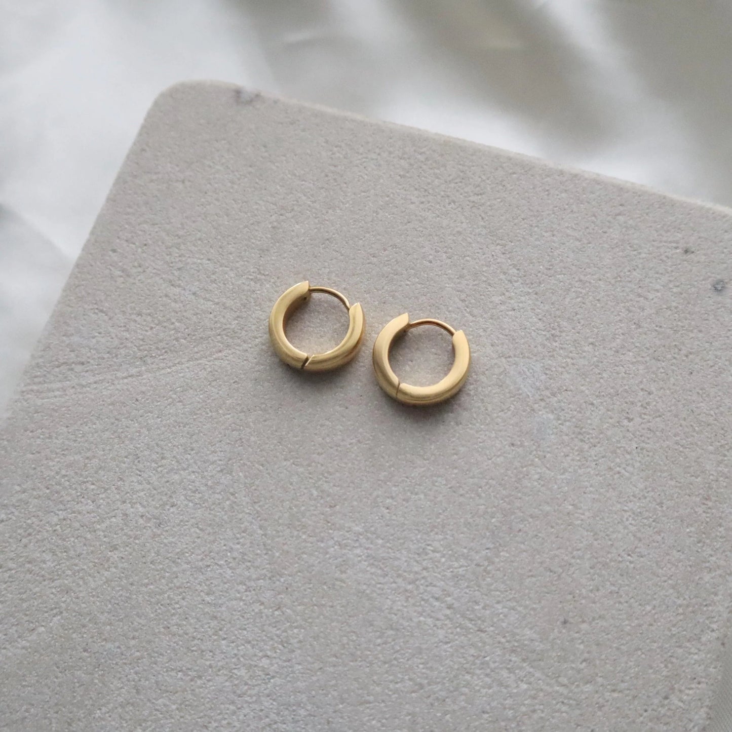 Sadie Hoops | Minimalistic Hoops - JESSA JEWELRY | GOLD JEWELRY; dainty, affordable gold everyday jewelry. Tarnish free, water-resistant, hypoallergenic. Jewelry for everyday wear