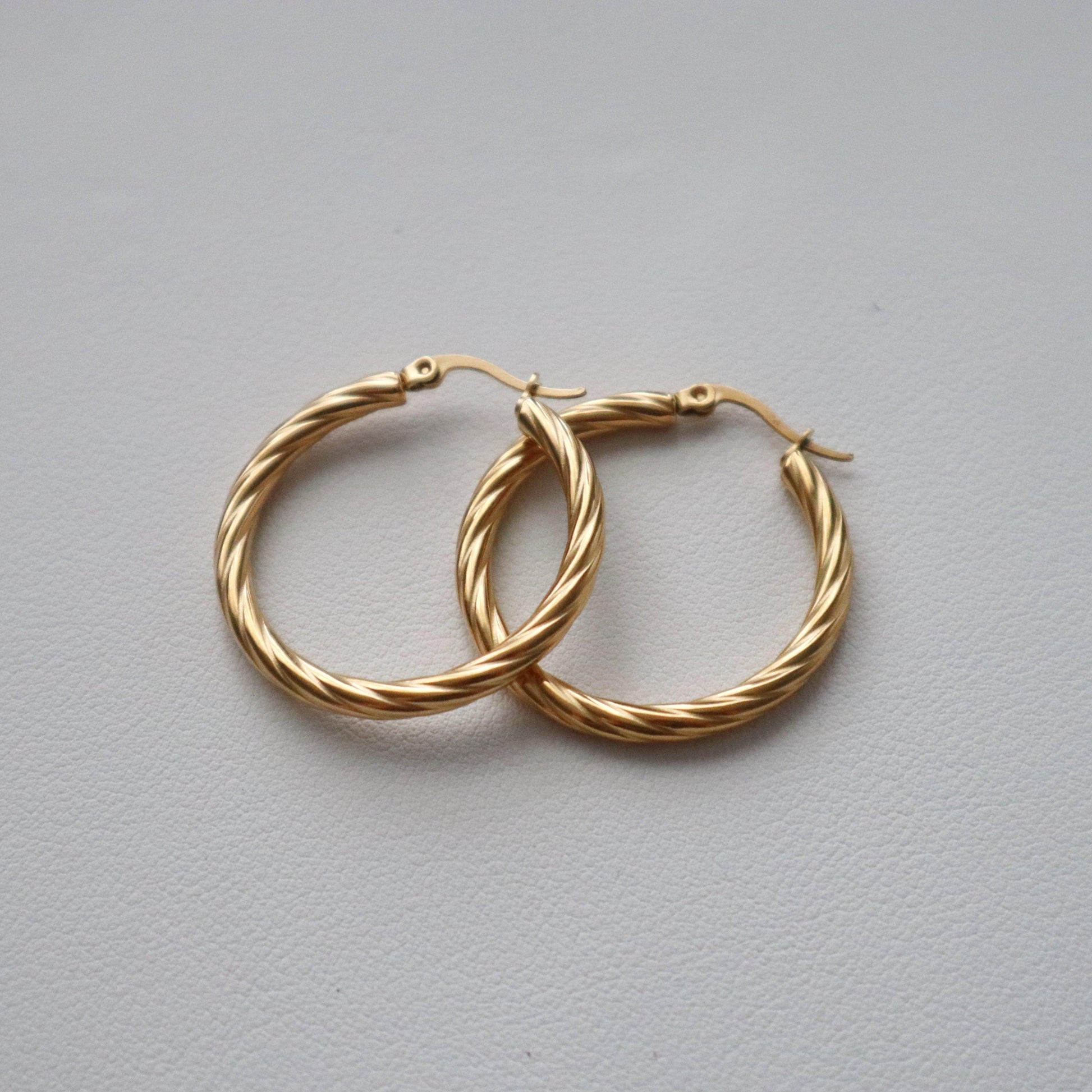 Twisted Hoops - JESSA JEWELRY | GOLD JEWELRY; dainty, affordable gold everyday jewelry. Tarnish free, water-resistant, hypoallergenic. Jewelry for everyday wear
