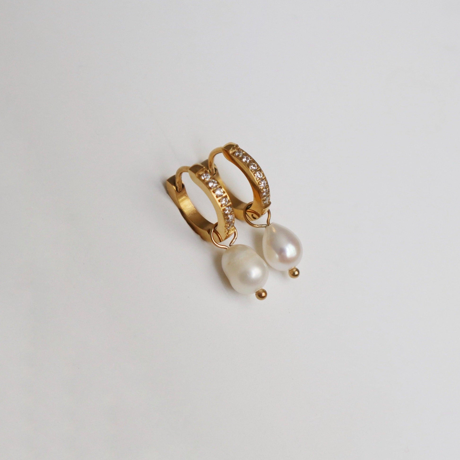 CZ Huggies with Pearl Drop - JESSA JEWELRY | GOLD JEWELRY; dainty, affordable gold everyday jewelry. Tarnish free, water-resistant, hypoallergenic. Jewelry for everyday wear