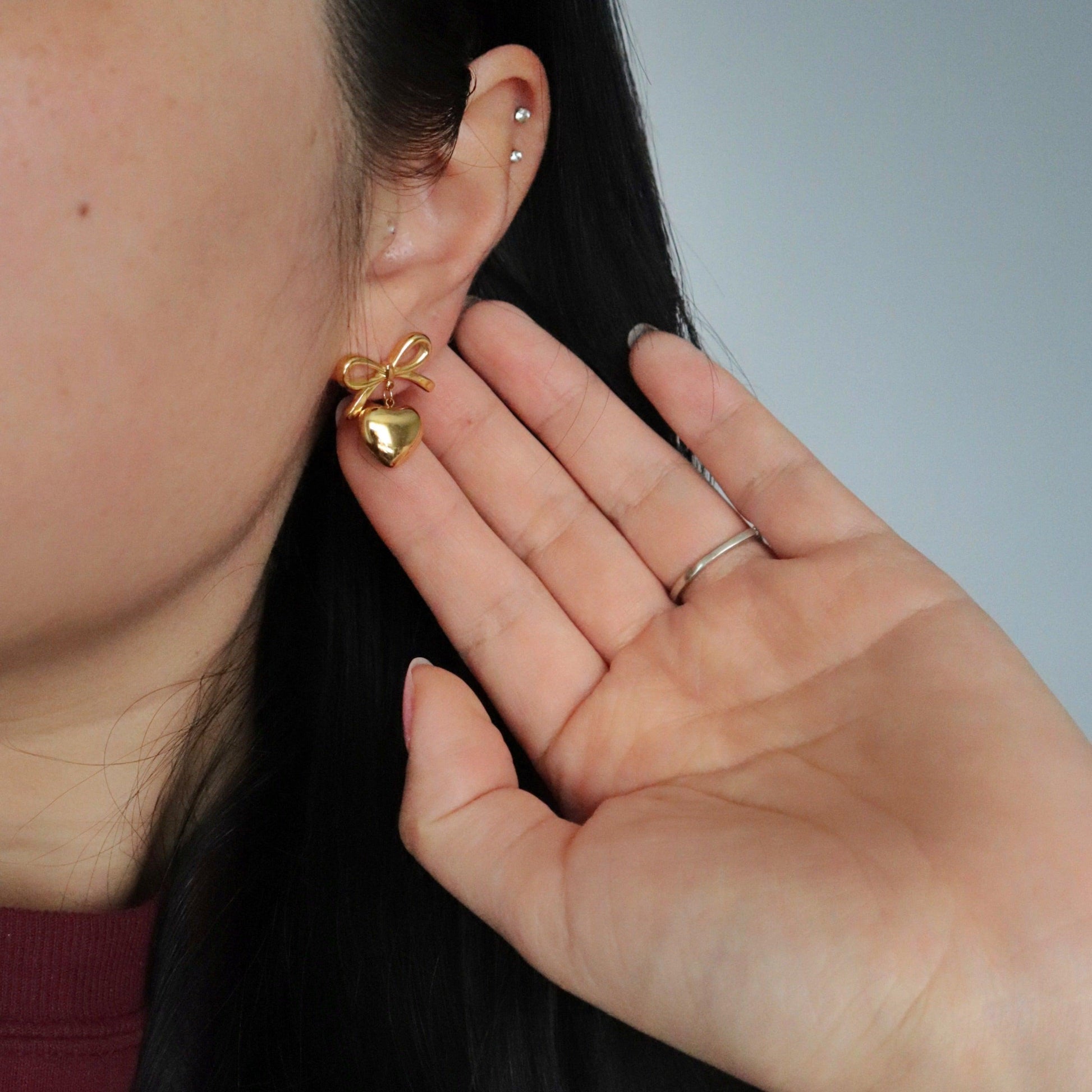 Bow Heart Earrings | Dangle Earrings - JESSA JEWELRY | GOLD JEWELRY; dainty, affordable gold everyday jewelry. Tarnish free, water-resistant, hypoallergenic. Jewelry for everyday wear
