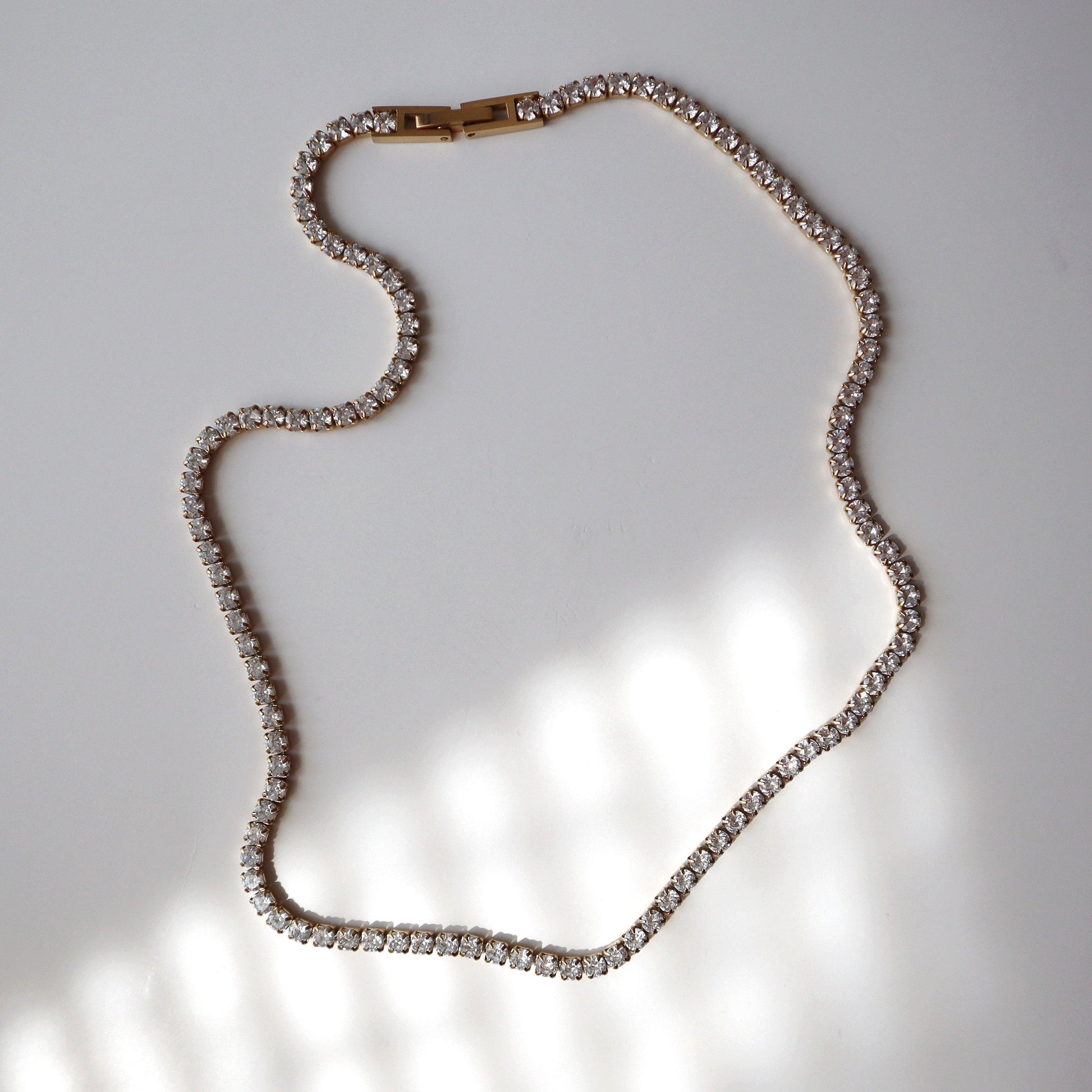 CZ Tennis Necklace - JESSA JEWELRY | GOLD JEWELRY; dainty, affordable gold everyday jewelry. Tarnish free, water-resistant, hypoallergenic. Jewelry for everyday wear