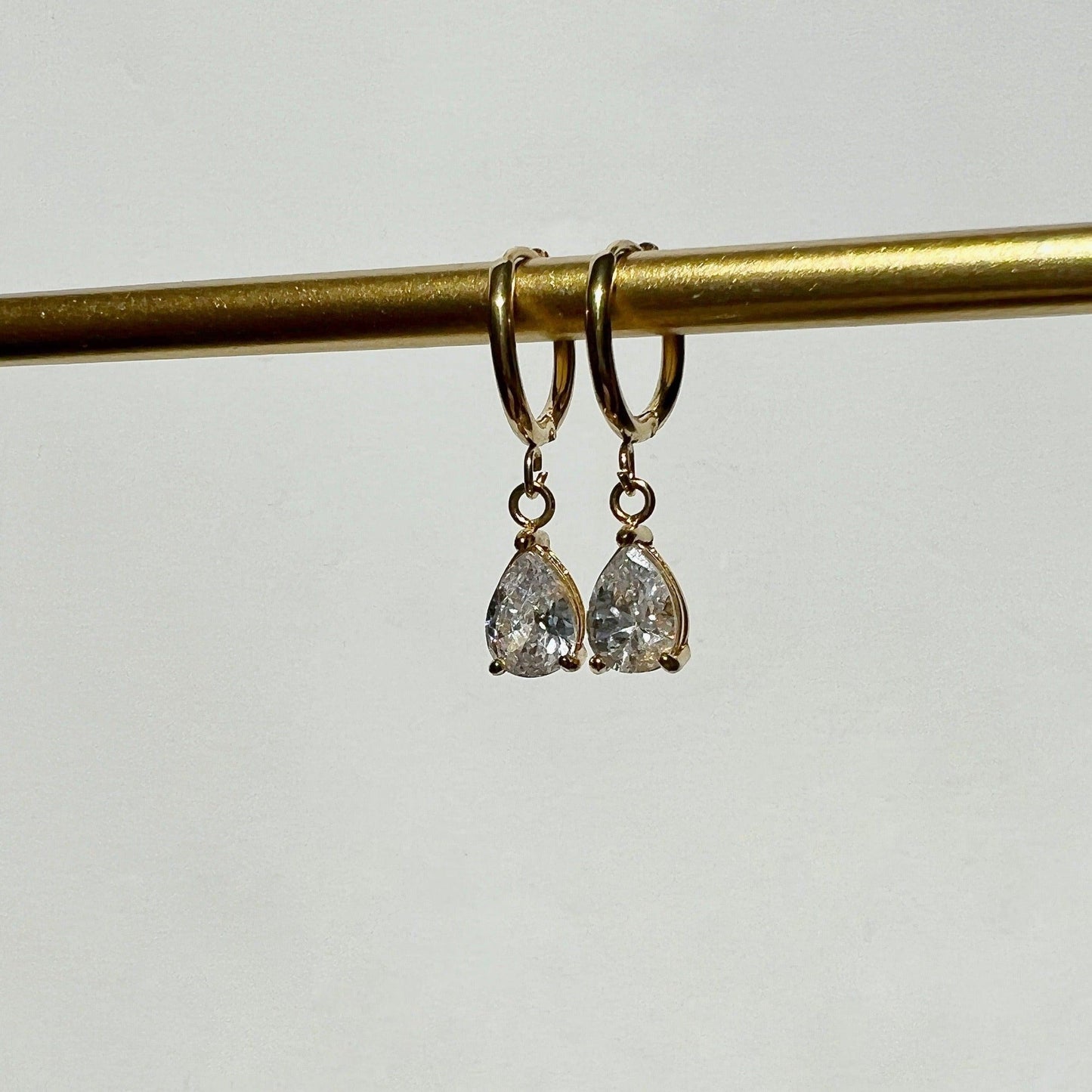 Teardrop Huggies - JESSA JEWELRY | GOLD JEWELRY; dainty, affordable gold everyday jewelry. Tarnish free, water-resistant, hypoallergenic. Jewelry for everyday wear