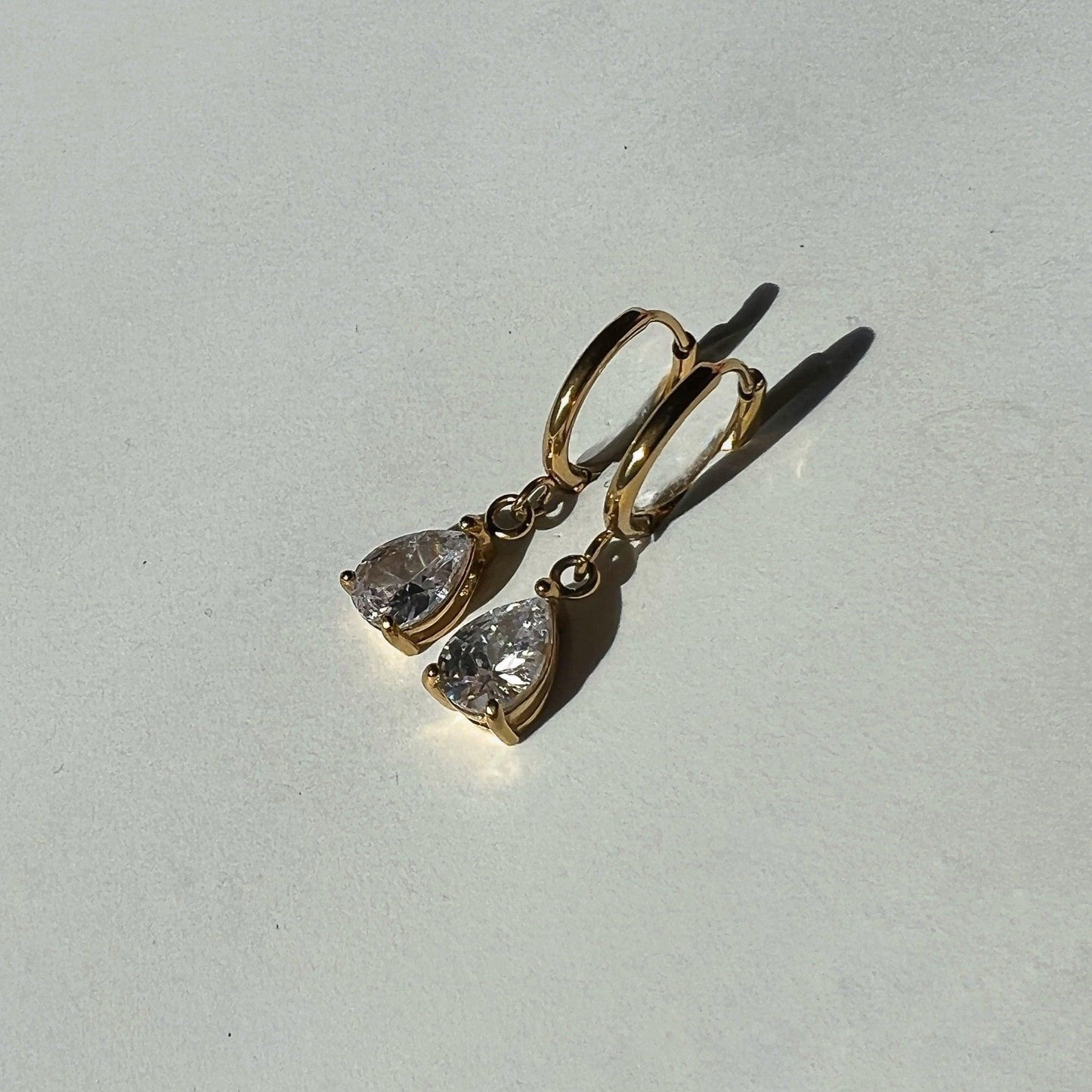Teardrop Huggies - JESSA JEWELRY | GOLD JEWELRY; dainty, affordable gold everyday jewelry. Tarnish free, water-resistant, hypoallergenic. Jewelry for everyday wear