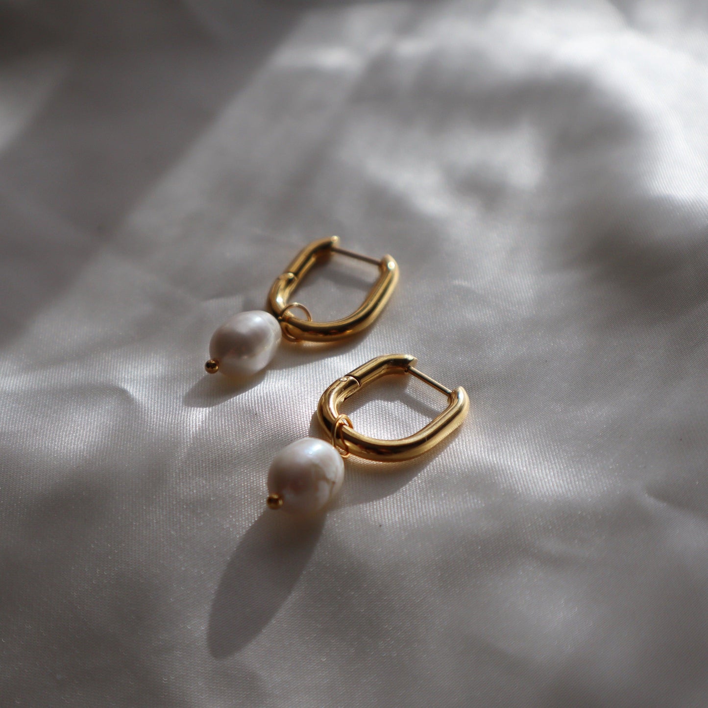 Grace Hoops | Oval Hoops with Pearl Drop - JESSA JEWELRY | GOLD JEWELRY; dainty, affordable gold everyday jewelry. Tarnish free, water-resistant, hypoallergenic. Jewelry for everyday wear