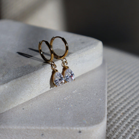 Teardrop Huggies - JESSA JEWELRY | GOLD JEWELRY; dainty, affordable gold everyday jewelry. Tarnish free, water-resistant, hypoallergenic. Jewelry for everyday wear