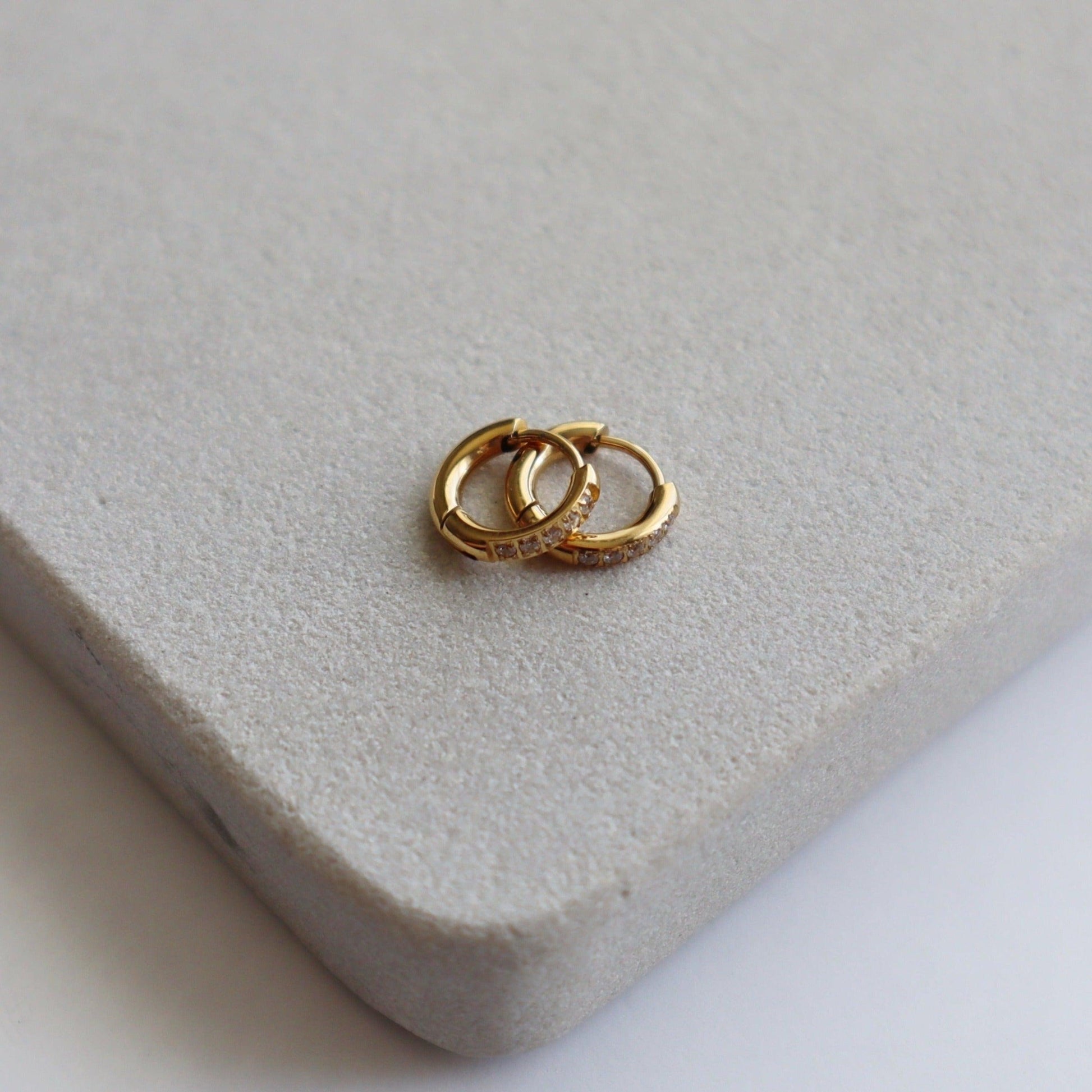 Hailey Huggies | Dainty CZ Huggies - JESSA JEWELRY | GOLD JEWELRY; dainty, affordable gold everyday jewelry. Tarnish free, water-resistant, hypoallergenic. Jewelry for everyday wear