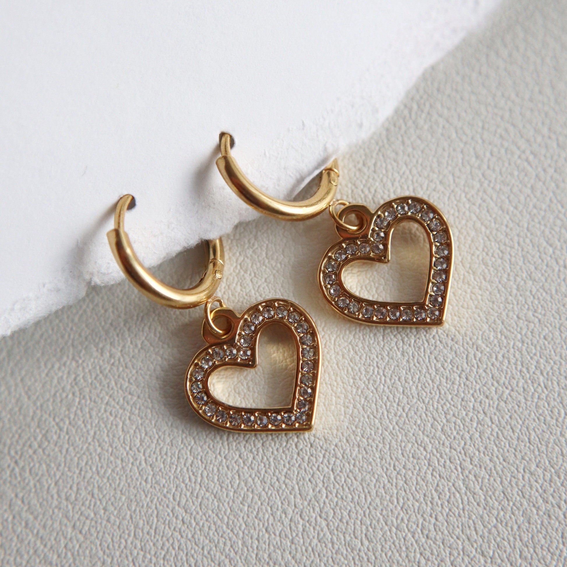 Studded Heart Huggies - JESSA JEWELRY | GOLD JEWELRY; dainty, affordable gold everyday jewelry. Tarnish free, water-resistant, hypoallergenic. Jewelry for everyday wear