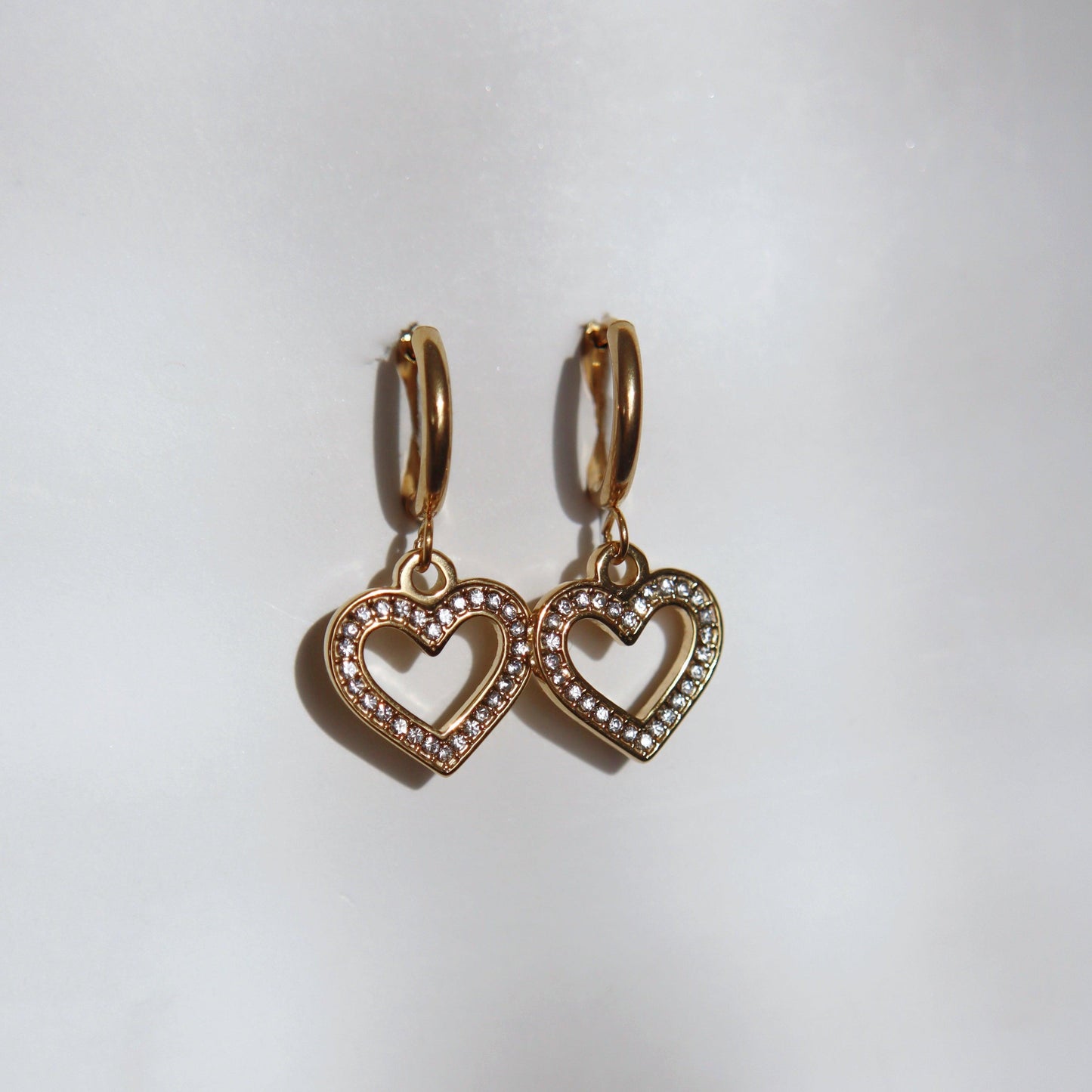Studded Heart Huggies - JESSA JEWELRY | GOLD JEWELRY; dainty, affordable gold everyday jewelry. Tarnish free, water-resistant, hypoallergenic. Jewelry for everyday wear