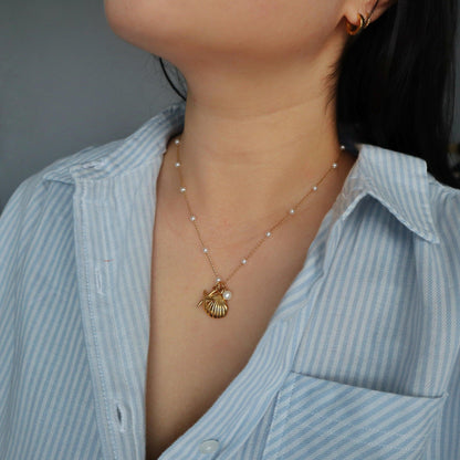 By the Shore Necklace | Shell and Star Pendant - JESSA JEWELRY | GOLD JEWELRY; dainty, affordable gold everyday jewelry. Tarnish free, water-resistant, hypoallergenic. Jewelry for everyday wear