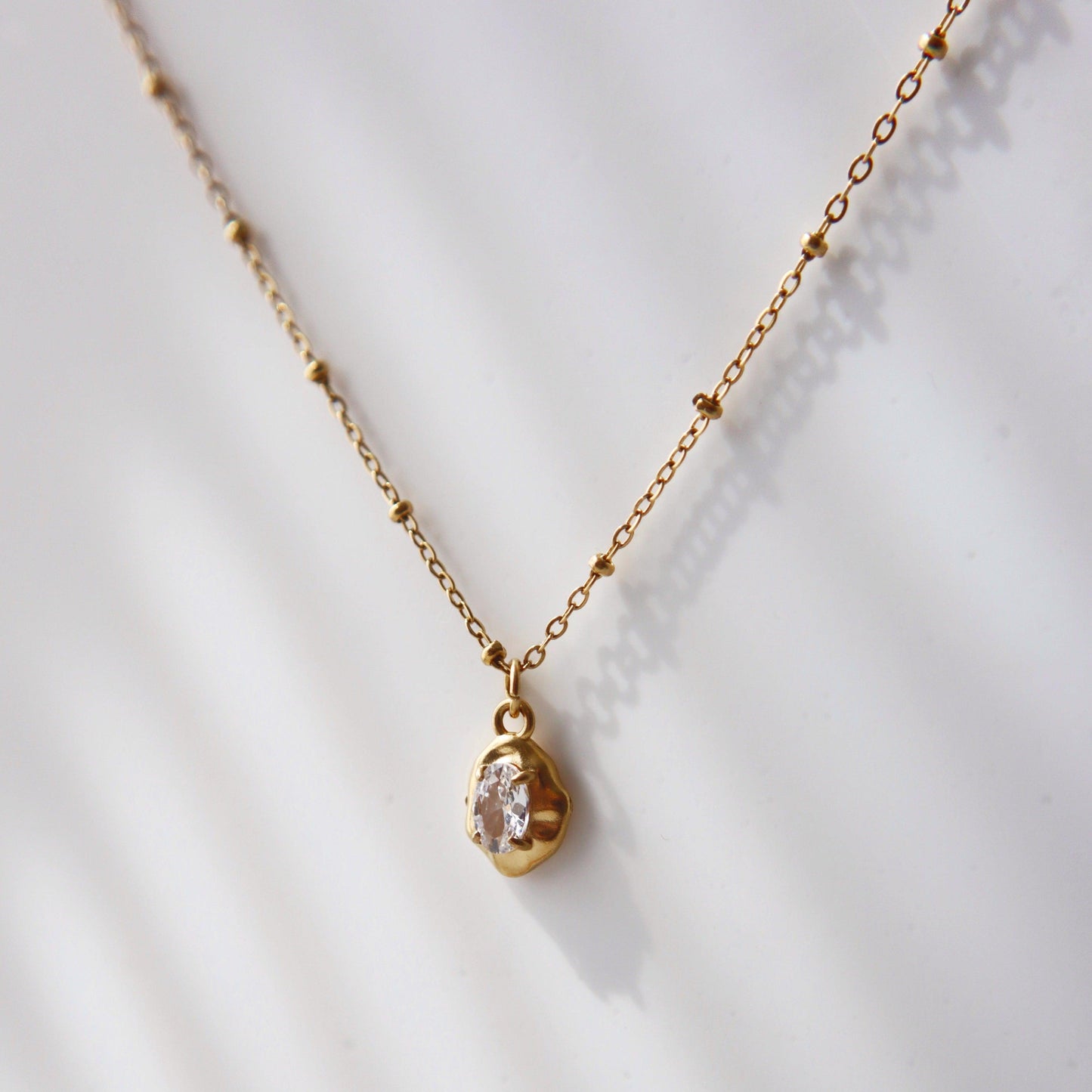 Raina Pebble Necklace | Pendant Necklace - JESSA JEWELRY | GOLD JEWELRY; dainty, affordable gold everyday jewelry. Tarnish free, water-resistant, hypoallergenic. Jewelry for everyday wear
