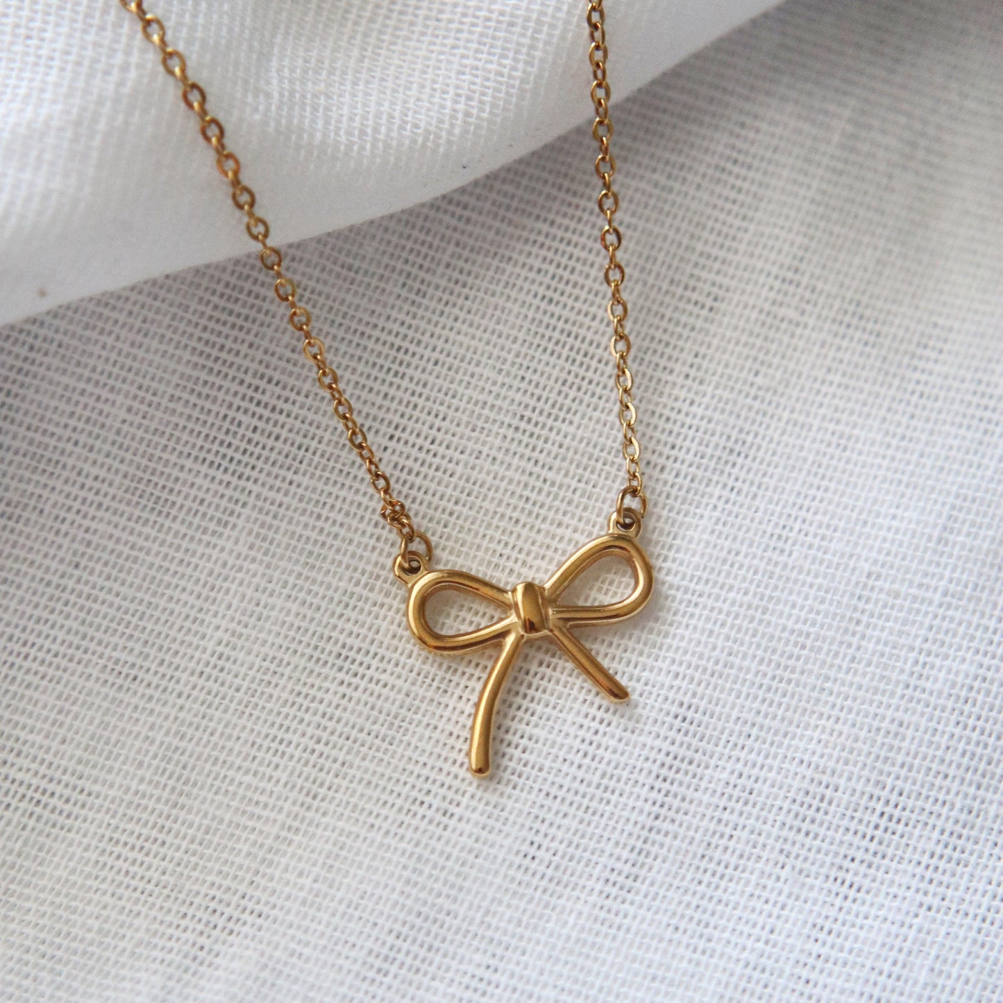 Bow Necklace - JESSA JEWELRY | GOLD JEWELRY; dainty, affordable gold everyday jewelry. Tarnish free, water-resistant, hypoallergenic. Jewelry for everyday wear