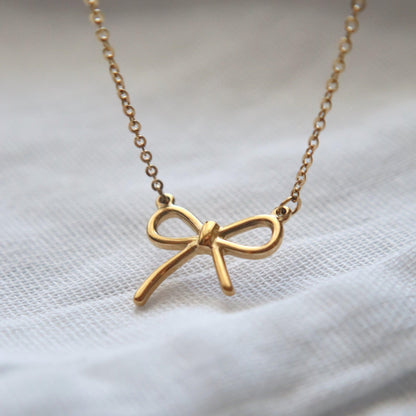 Bow Necklace - JESSA JEWELRY | GOLD JEWELRY; dainty, affordable gold everyday jewelry. Tarnish free, water-resistant, hypoallergenic. Jewelry for everyday wear