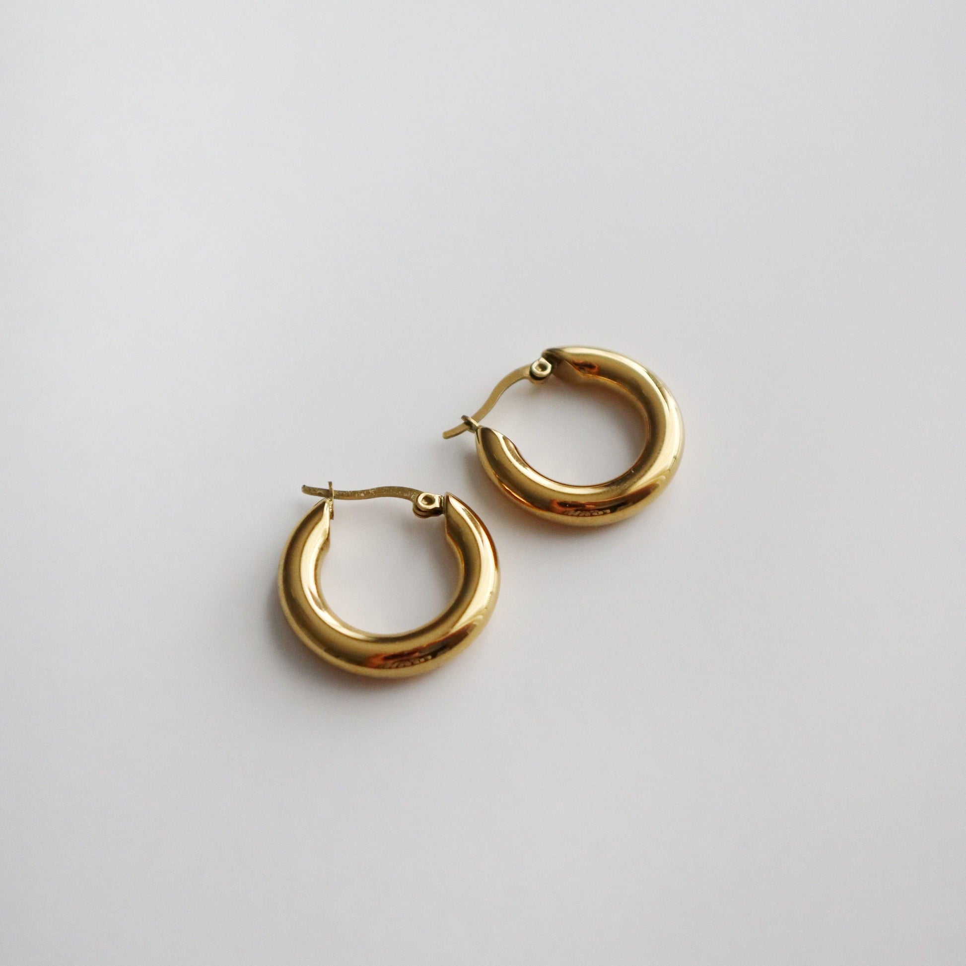 Audrey Hoops | Minimalistic Classic Hoops - JESSA JEWELRY | GOLD JEWELRY; dainty, affordable gold everyday jewelry. Tarnish free, water-resistant, hypoallergenic. Jewelry for everyday wear