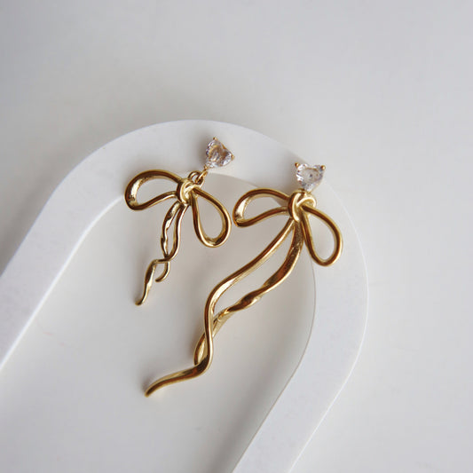 Keira Bow Dangle Earrings - JESSA JEWELRY | GOLD JEWELRY; dainty, affordable gold everyday jewelry. Tarnish free, water-resistant, hypoallergenic. Jewelry for everyday wear