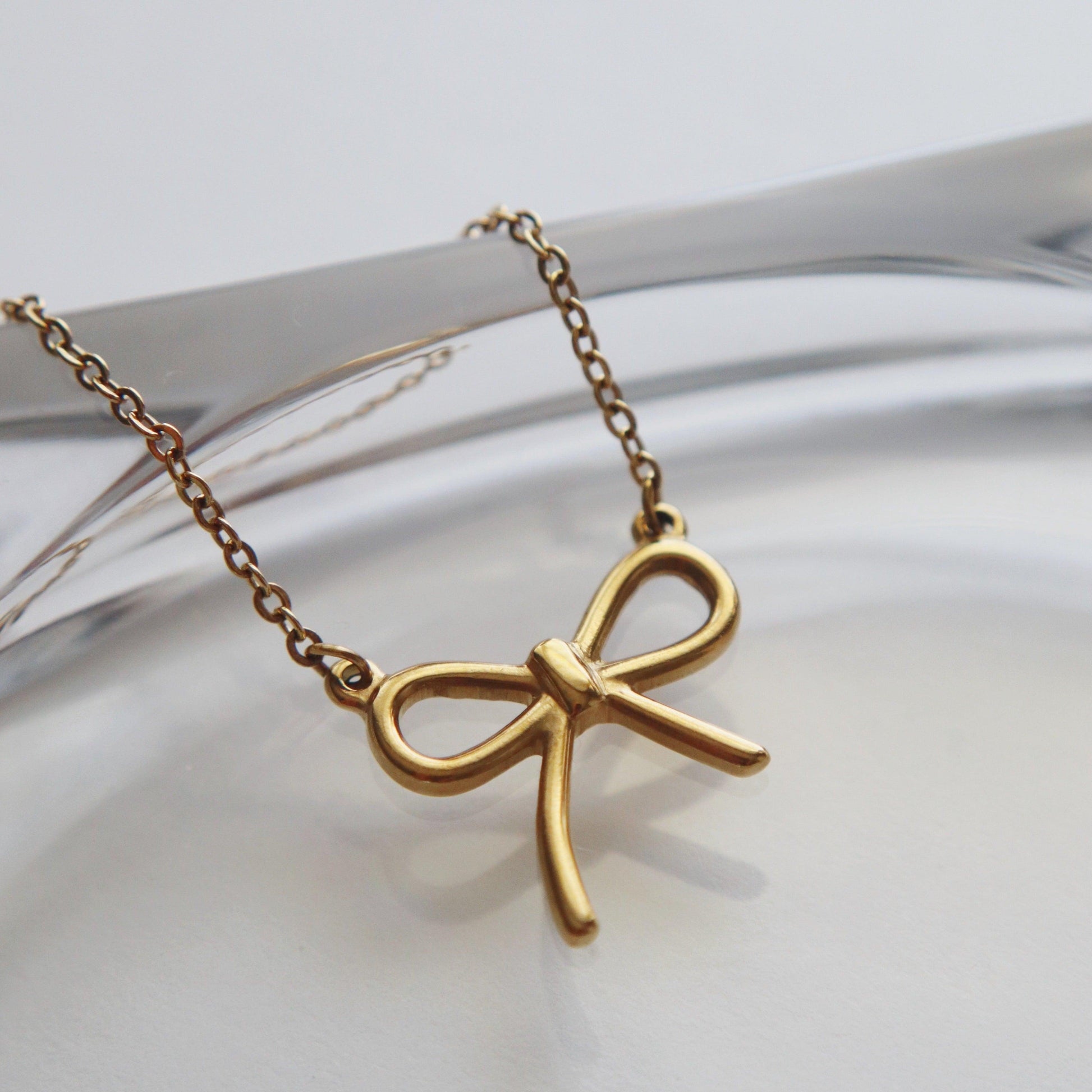 Bow Necklace - JESSA JEWELRY | GOLD JEWELRY; dainty, affordable gold everyday jewelry. Tarnish free, water-resistant, hypoallergenic. Jewelry for everyday wear