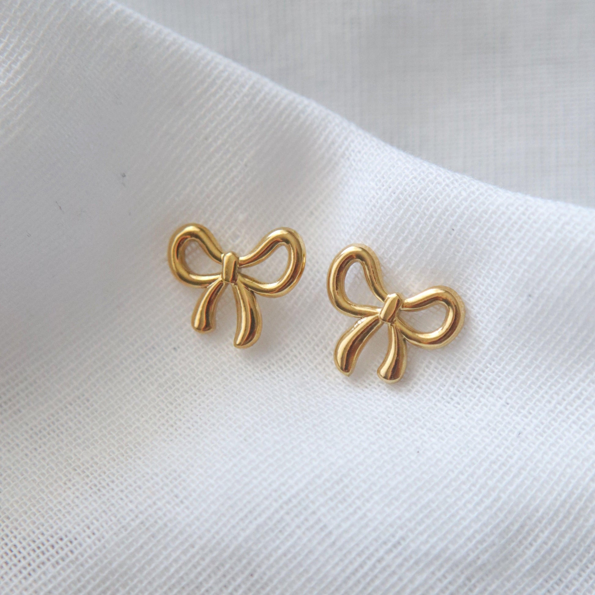 Bow Earrings - JESSA JEWELRY | GOLD JEWELRY; dainty, affordable gold everyday jewelry. Tarnish free, water-resistant, hypoallergenic. Jewelry for everyday wear